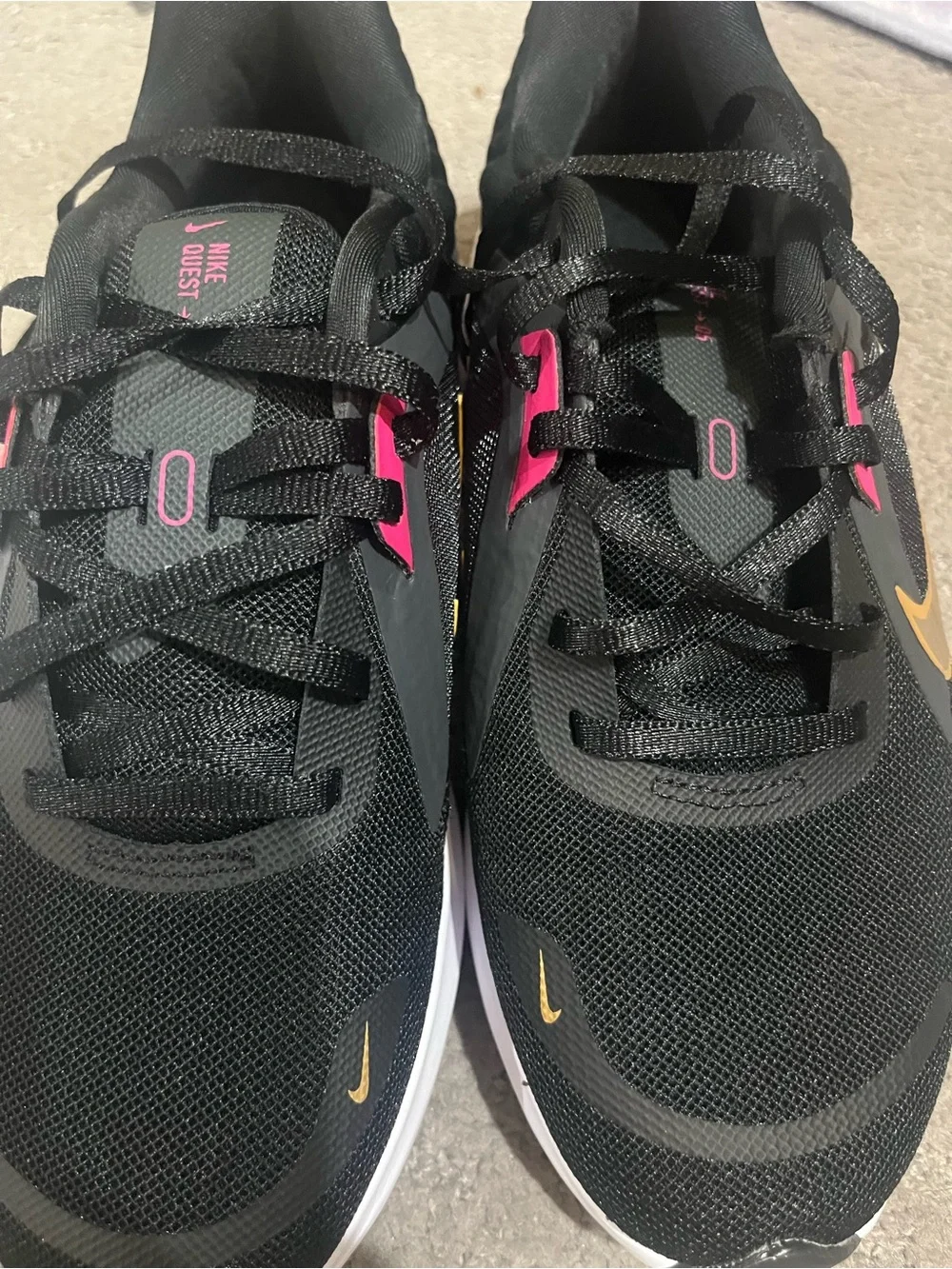 Nike Women’s Black/Purple Running Shoes with Gold Swoosh